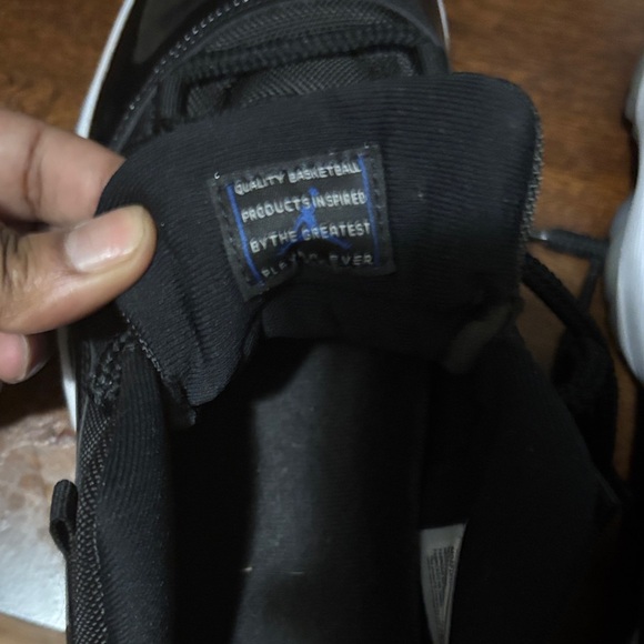 Black Low-Top Athletic Sneakers with White Midsole